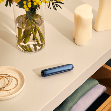 Ploom AURA front panel Navy Blue Augmented Pattern accessory on device
