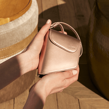 Ploom AURA Rose Gold Solo and Duo Carry Case accessories in a drawer
